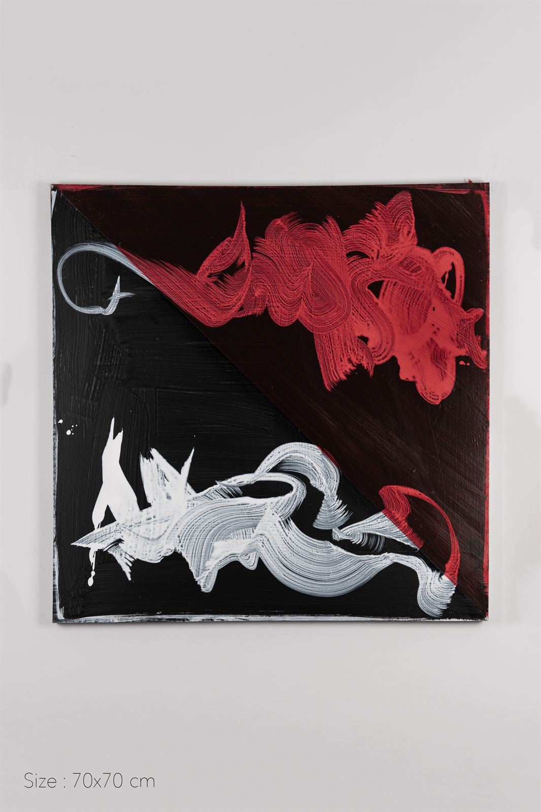 A square canvas split on the diagonal — red gesture above, white gesture below